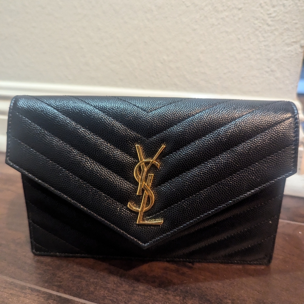 YSL monogram small wallet with chain, Black with gold chain. 4.9"H x 7.5"W x 1.4